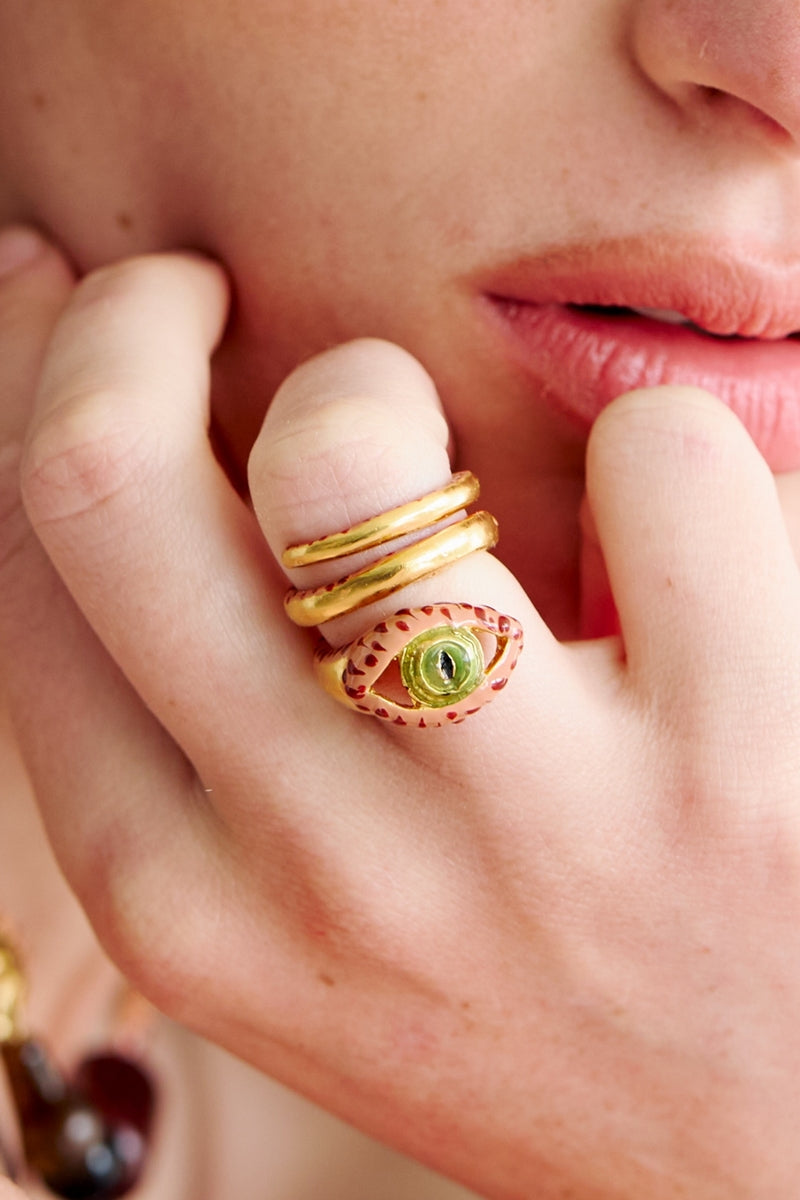 Sara & Flora terracotta spiral eye ring featuring a unique coiled design, perfect for stylish jewelry collection.
