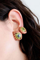 Terracotta midi cat eye earrings by Sara & Flora with a sleek, curved design and warm earthy tones.