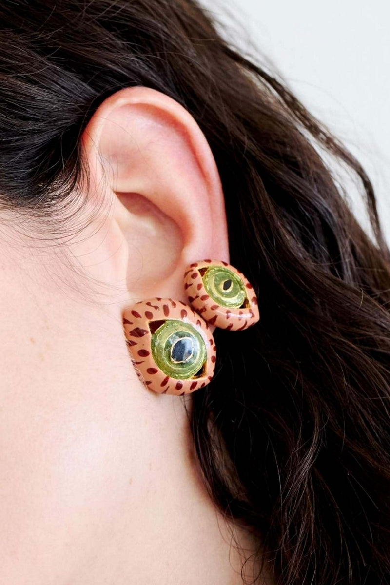 Terracotta midi cat eye earrings by Sara & Flora with a sleek, curved design and warm earthy tones.