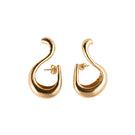 Sara & Flora Maxi Tummy Hoops earrings featuring large gold hoops with a sleek, modern design.