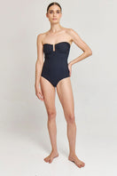 Aguaclara black one-piece swimsuit with classic design, featuring a sleek and simple style, perfect for swimming and beachwear.