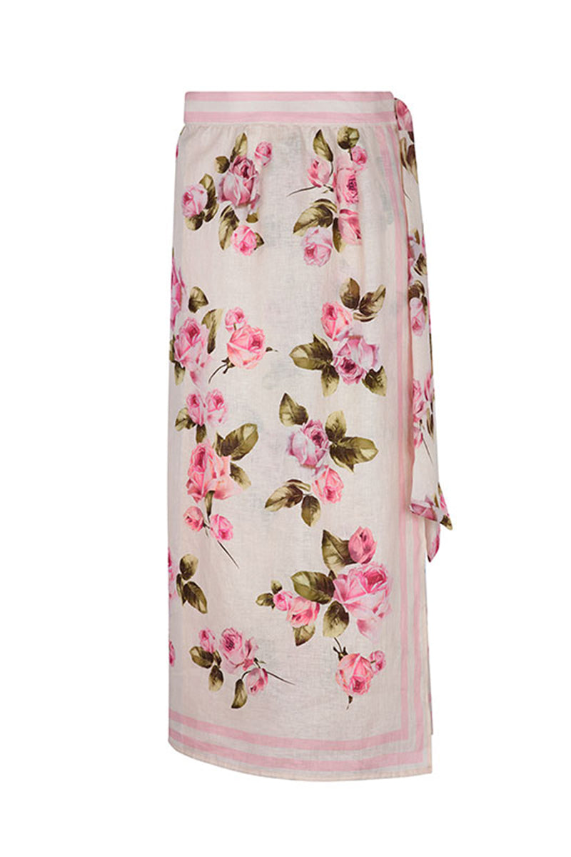 Aguaclara rose wrap midi skirt with a flowy fabric and floral pattern, displayed on a neutral background.