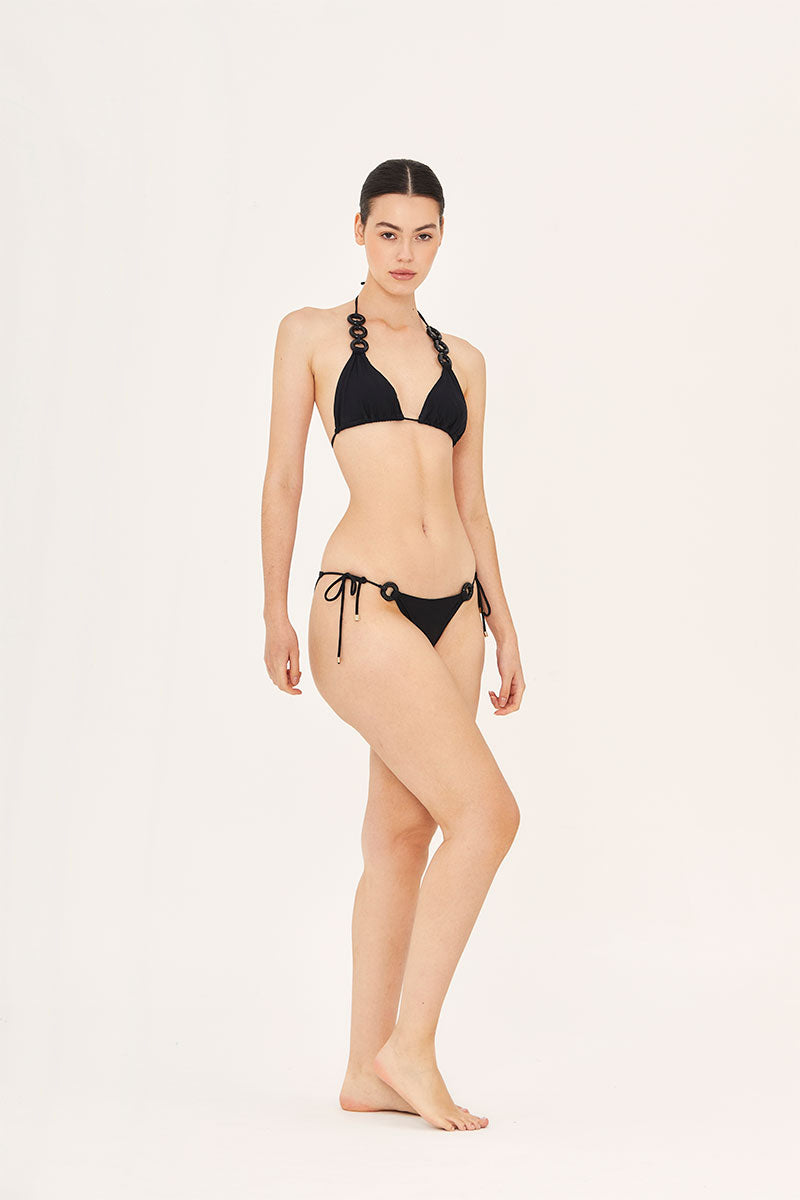 Black side tie bikini bottoms by Aguaclara featuring adjustable ties on each side and a sleek, minimal design.