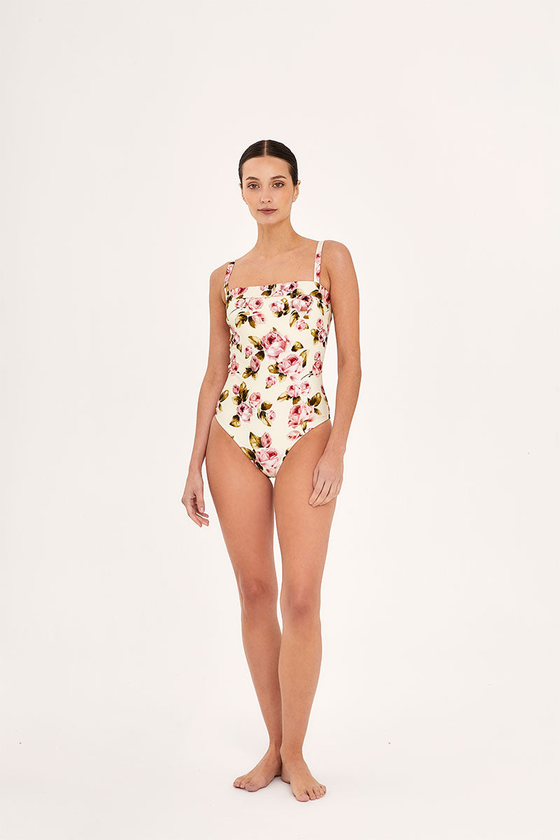 Aguaclara Rose One-Piece Swimsuit featuring a vibrant pink floral design and a classic fit, displayed on a mannequin.