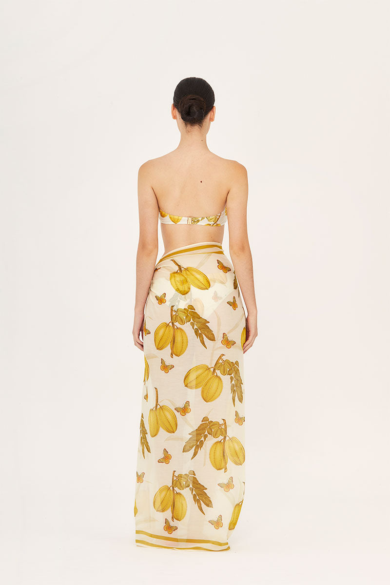 Aguaclara L'EST PAREO cover-up in vibrant fabric, shown as a flowing, lightweight wrap for beach or poolside wear.