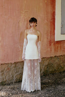 Elegant CYREN gown by Gigii's featuring flowing fabric and intricate detailing, perfect for formal occasions.