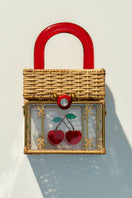 Waiwai Rio Cacau Cherry top handle bag with a sleek design and cherry pattern, featuring a stylish top handle for versatile carry.