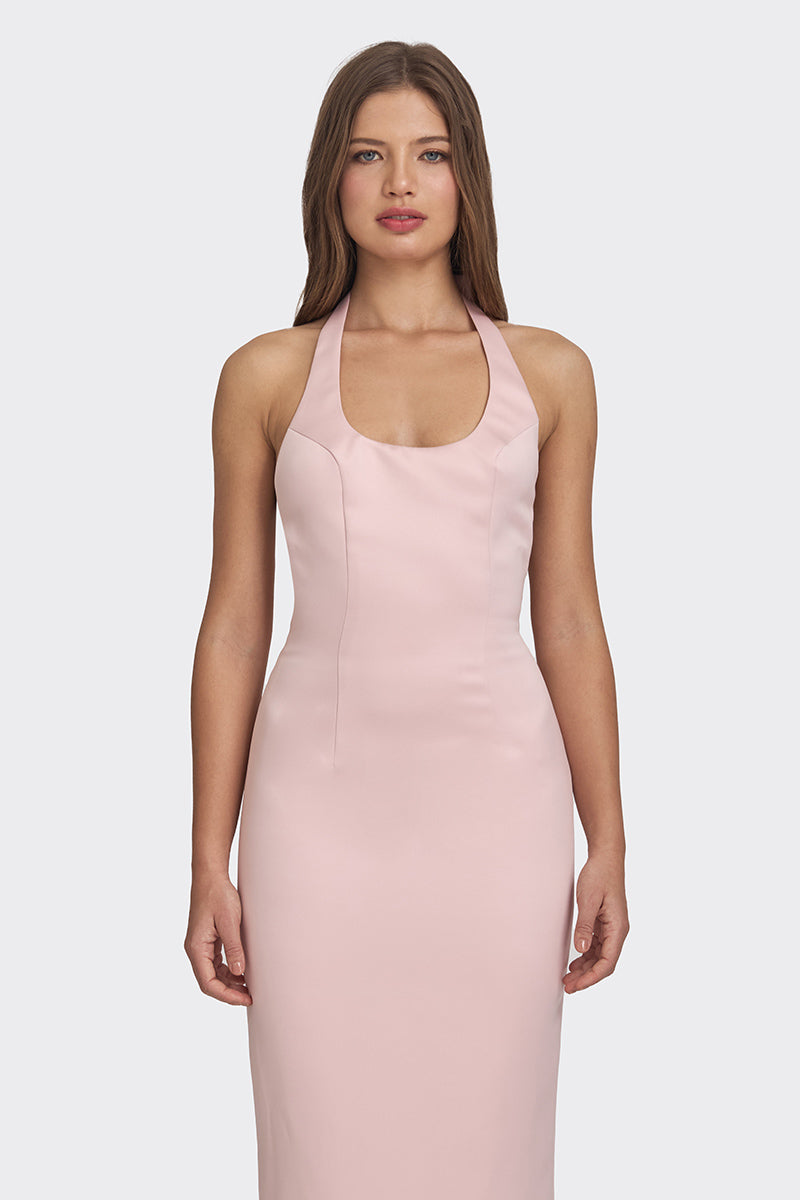 Dusty pink cake bow gown by Stolen Stores featuring a flowing maxi dress with elegant bow details and a sophisticated silhouette.