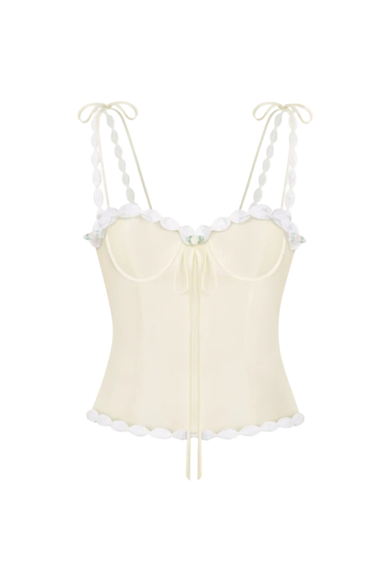 Light yellow cake bustier top from Stolen Stores, featuring a fitted design and stylish strapless silhouette.