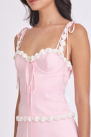 Light pink cake bustier top by Stolen Stores, featuring a fitted design with decorative detailing and structured silhouette.