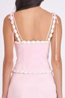 Light pink cake bustier top by Stolen Stores, featuring a fitted design with decorative detailing and a stylish, trendy look.