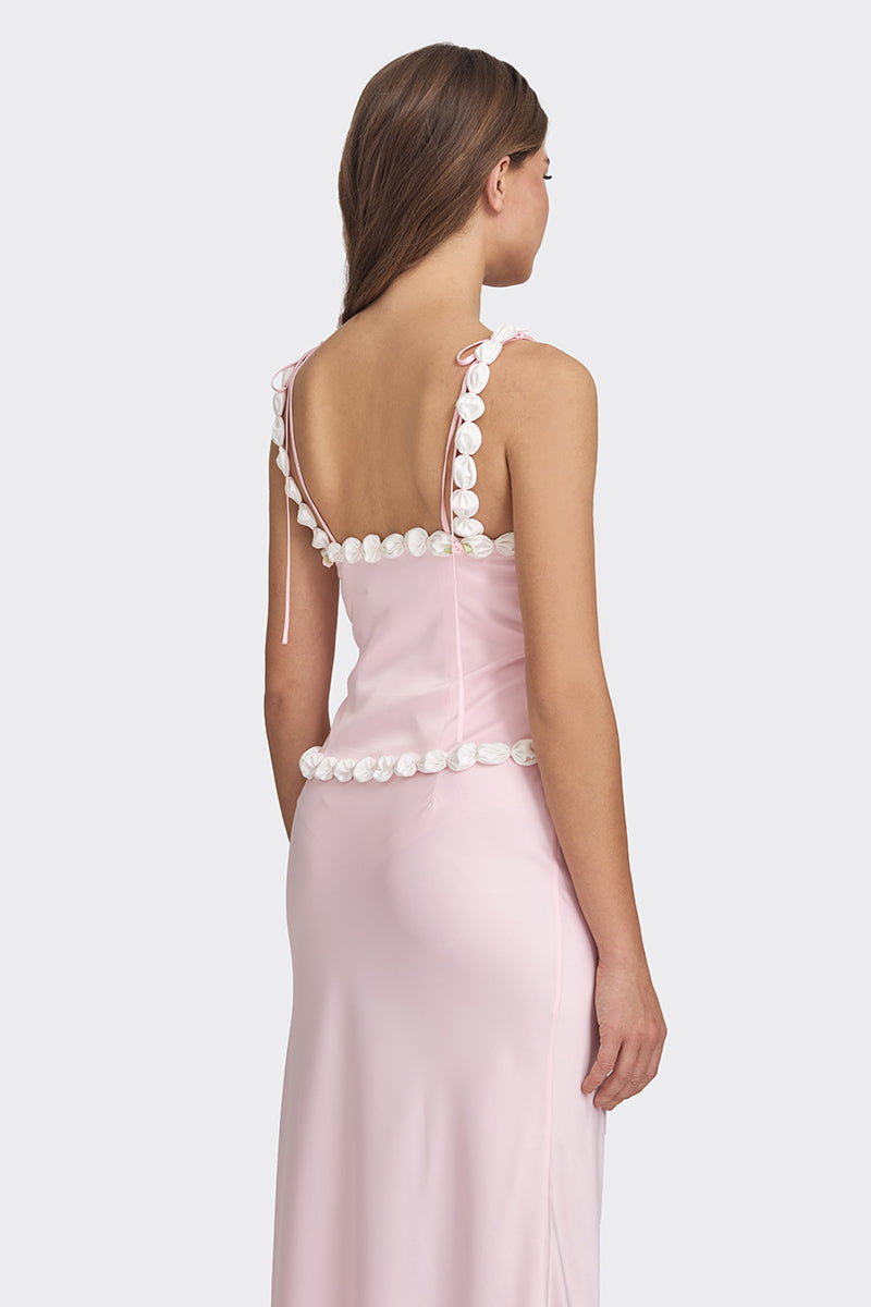 Light pink cake bustier top by Stolen Stores, featuring a fitted design and stylish details.