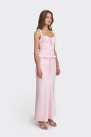 Light pink cake bustier top by Stolen Stores featuring a fitted, stylish design perfect for trendy fashion looks.