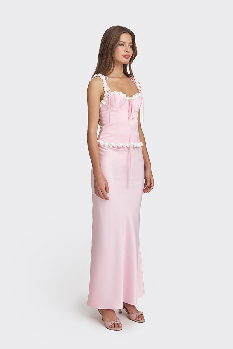 Light pink cake bustier top by Stolen Stores featuring a fitted, stylish design perfect for trendy fashion looks.