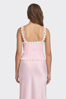 Light pink cake bustier top by Stolen Stores, featuring a fitted design and stylish details, shown on a model.