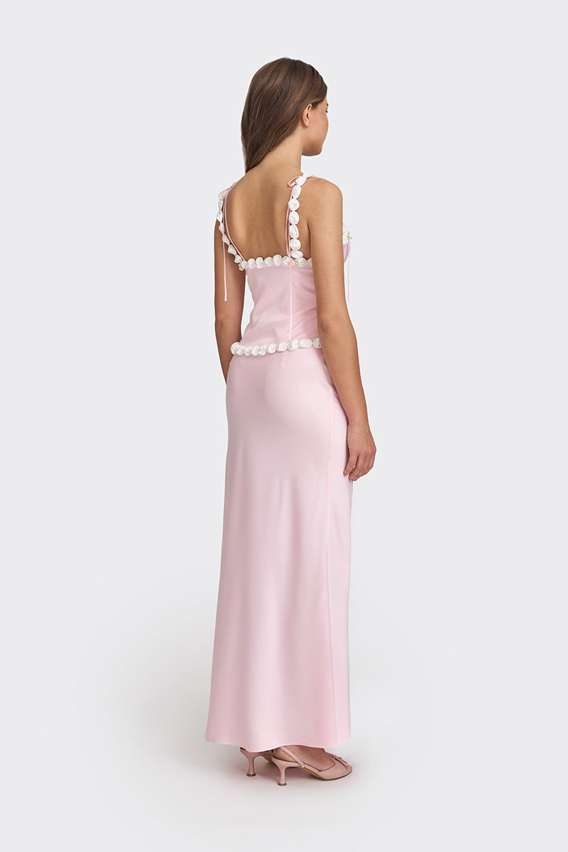 Light pink cake bustier top from Stolen Stores, featuring a fitted design and stylish details, perfect for trendy casual wear.