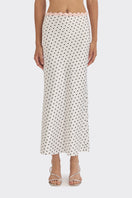 White Cake Maxi Polka Dot Skirt by Stolen Stores, featuring a flowy design and classic polka dot pattern.