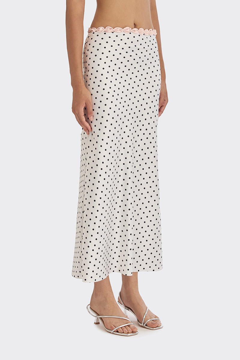 White Cake maxi skirt with black polka dots from Stolen Stores, flowing and stylish for casual or dressy occasions.