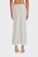 White Cake Maxi Skirt with black polka dots from Stolen Stores, flowing maxi skirt with a stylish, vintage-inspired design.