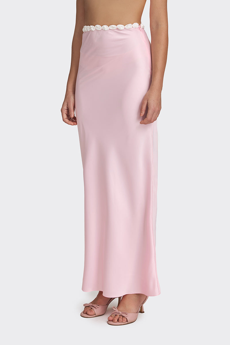 Light pink Cake maxi skirt by Stolen Stores, flowing fabric and elegant design perfect for casual or dressy occasions.
