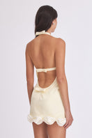 Light yellow Cake Bow Mini Dress by Stolen Stores, featuring a fitted silhouette and stylish design, shown on a model.