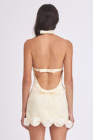 Light yellow Cake Bow mini dress by Stolen Stores, featuring a fitted silhouette and stylish design.