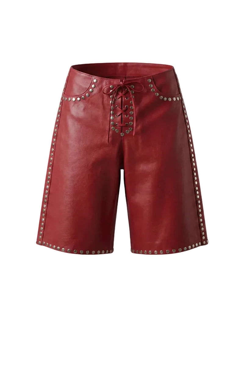 Red leather shorts with metal stud accents from Double A's Callie collection, styled with a high waist and edgy design.