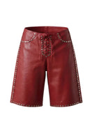 Red leather studded shorts by Double A, showcasing the stylish design and detailed studs on the Callie leather shorts.