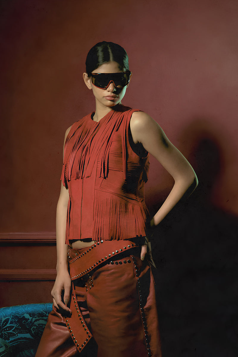 Red Callie leather shorts by Double A with metal stud embellishments, styled with a casual fit and high waist design.