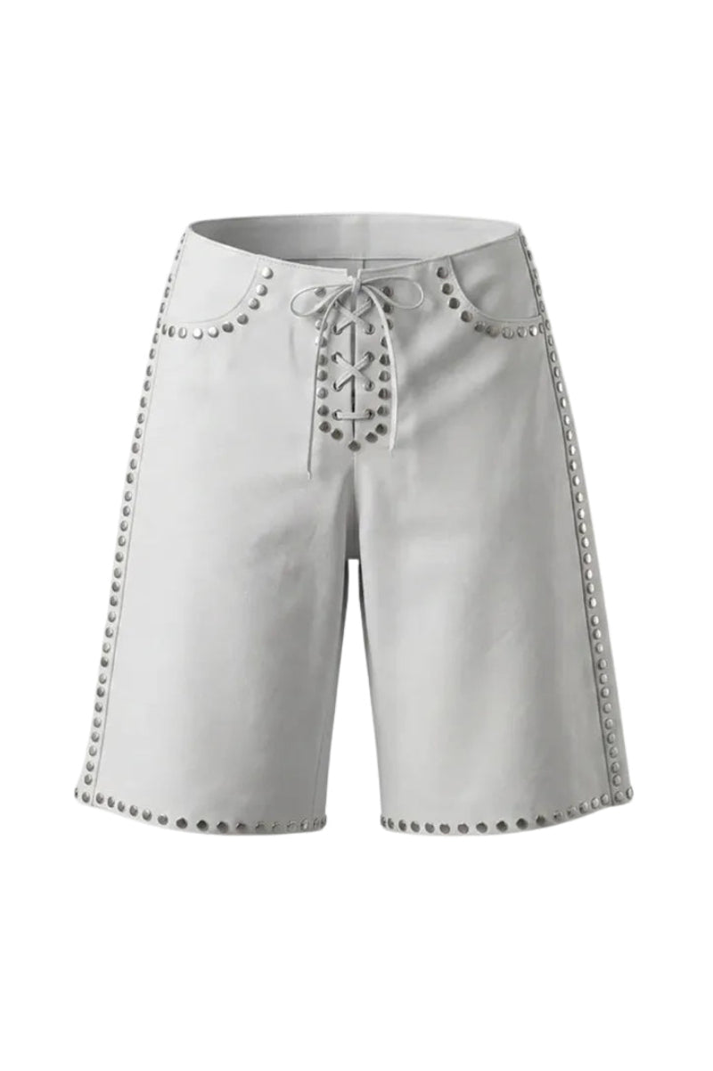 White leather shorts with studded accents from Double A's Callie collection, shown in a stylish close-up image.