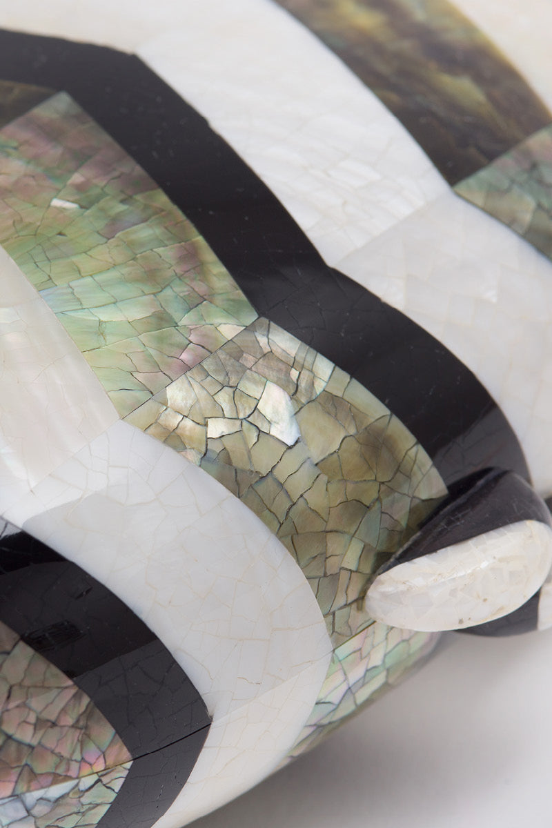 Freya Rose Calypso Mother of Pearl clutch bag with elegant design and shimmering surface, perfect for evening occasions.