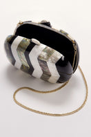 Freya Rose Calypso mother of pearl clutch bag with elegant design and shimmering surface, perfect for formal occasions.