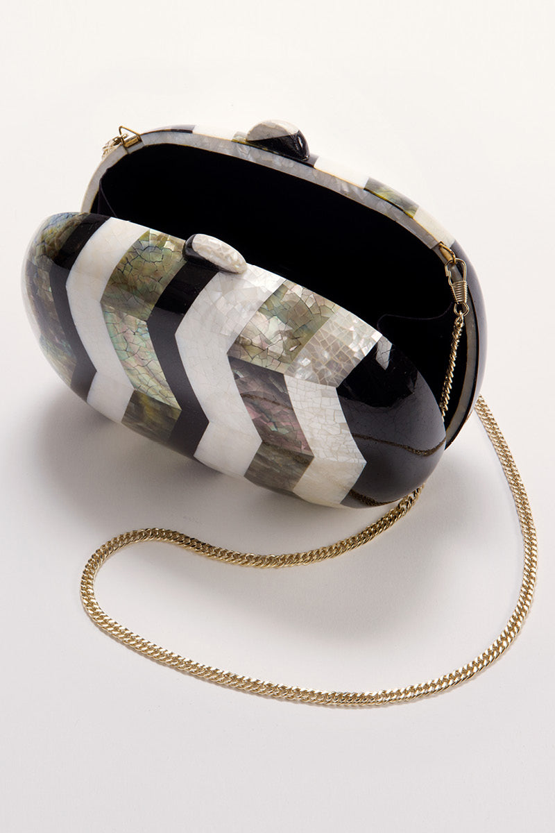 Freya Rose Calypso mother of pearl clutch bag with elegant design and shimmering surface, perfect for formal occasions.