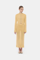 Camel long sleeve top by Montsand, soft fabric with a relaxed fit, shown on a model with a neutral background.