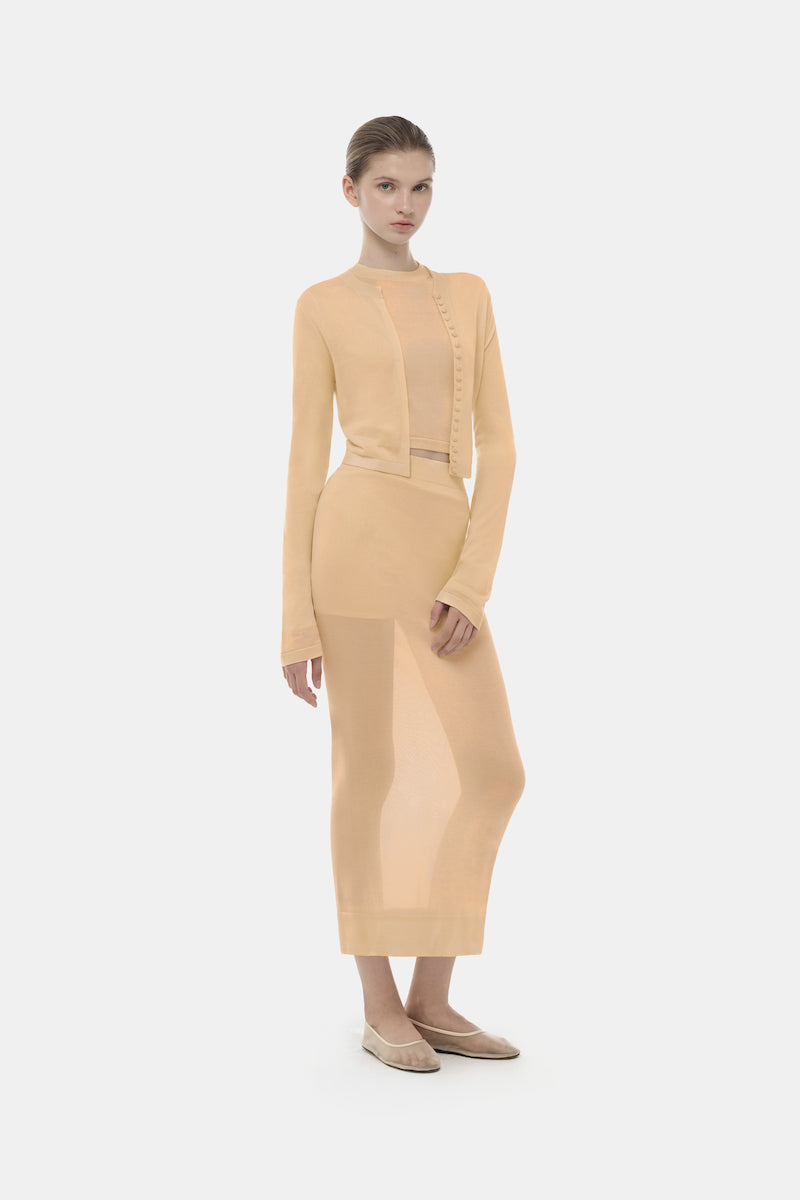 Camel long sleeve top by Montsand, showcasing a soft fabric and fitted design, perfect for casual or layered styling.
