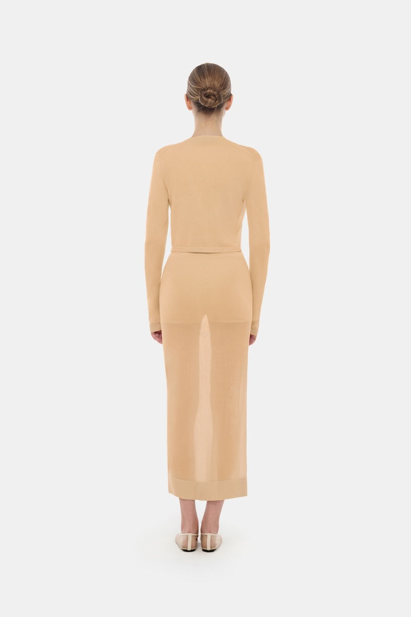 Camel long sleeve top by Montsand featuring a comfortable fit and soft fabric, shown on a model.
