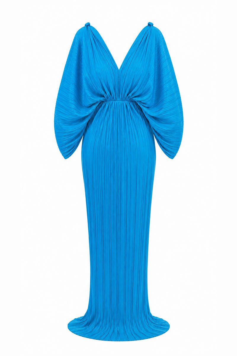 Ice blue Candela gown by Maylé Vásquez featuring elegant fabric and flowing design for formal occasions.