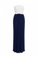 Navy blue and beige two-tone maxi dress by Maylé Vásquez, featuring flowing fabric and elegant design.