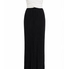 Black and white Canela two-tone maxi dress by Maylé Vásquez, flowing fabric with a stylish, elegant design.