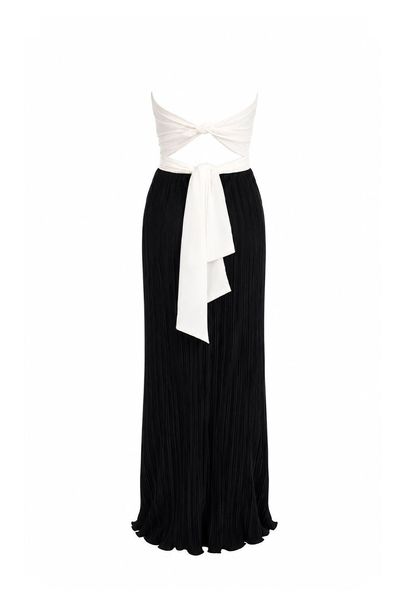Maylé Vásquez Canela Two Tone Maxi Dress in black and white, flowing fabric, elegant design, perfect for formal or casual wear.