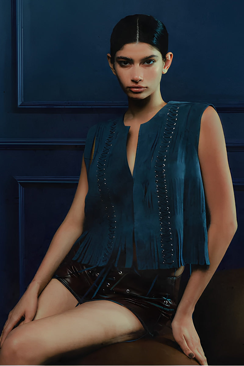Blue CANIAYLA II suede vest by Double A, displayed on a model, showcasing its stylish fit and soft suede material.