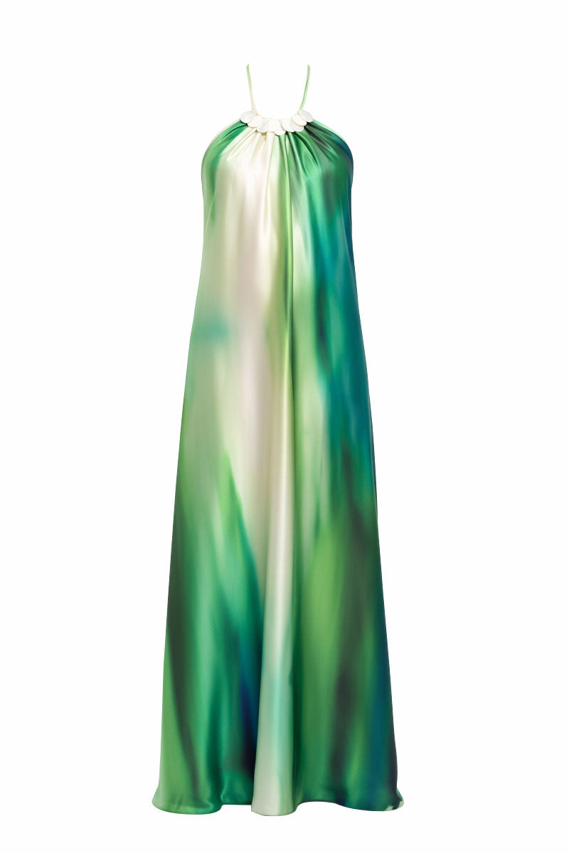 Maylé Vásquez CANTO Maxi Dress with vibrant river print, flowing fabric, and elegant design for stylish summer wear.