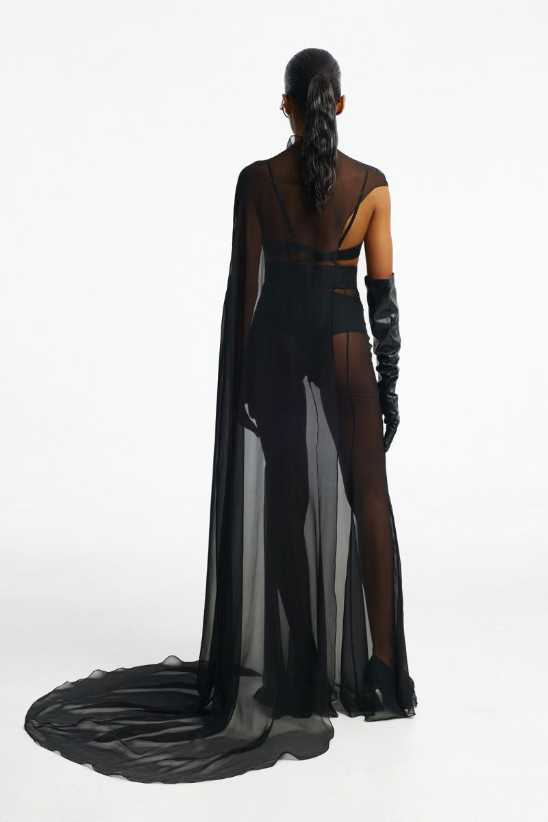 Black long cardigan cape by Santa Brands, featuring a flowing design and tailored fit, perfect for stylish layered outfits.