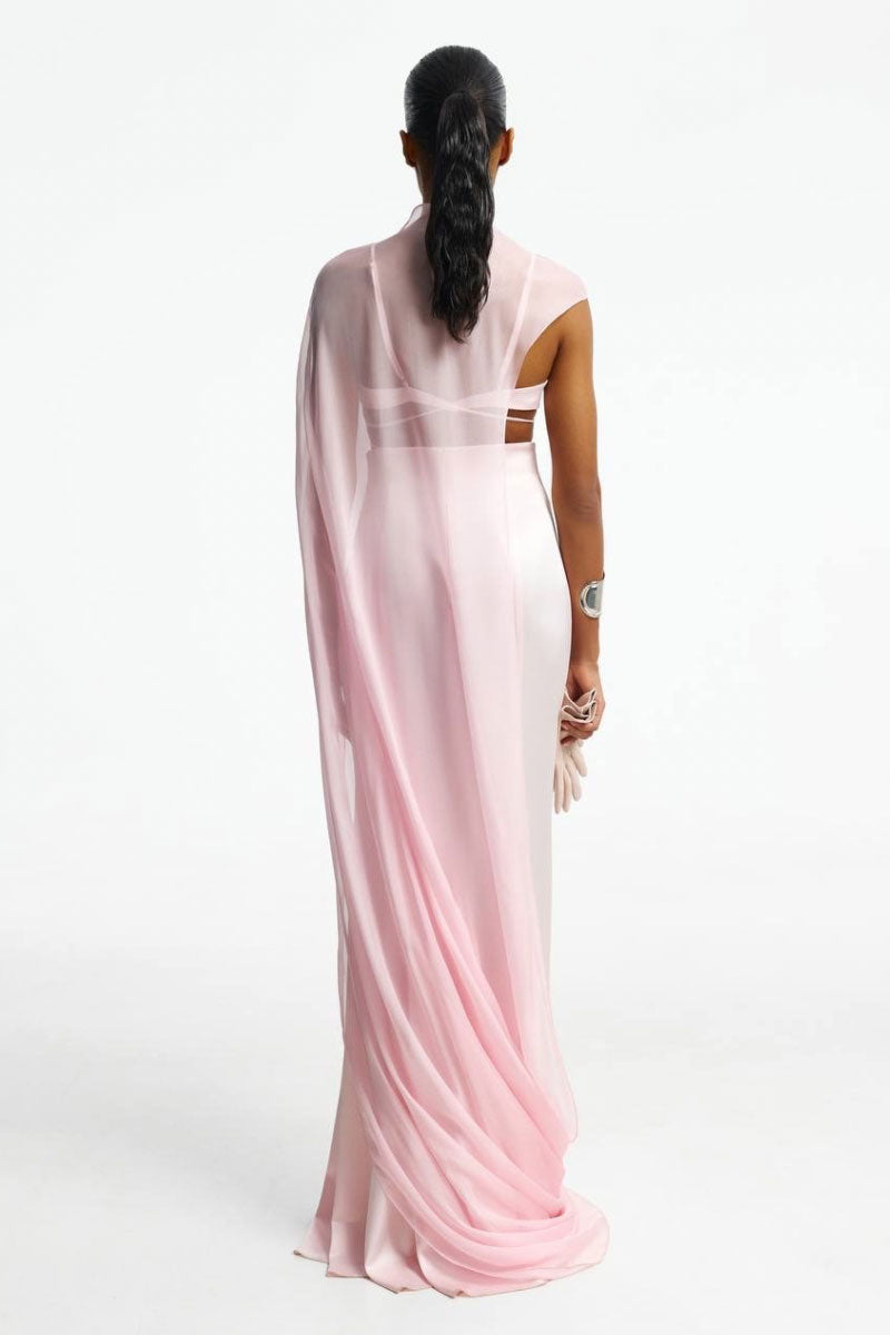 Blush-colored cardigan cape from Santa Brands, stylish and cozy outerwear for layered fashion.