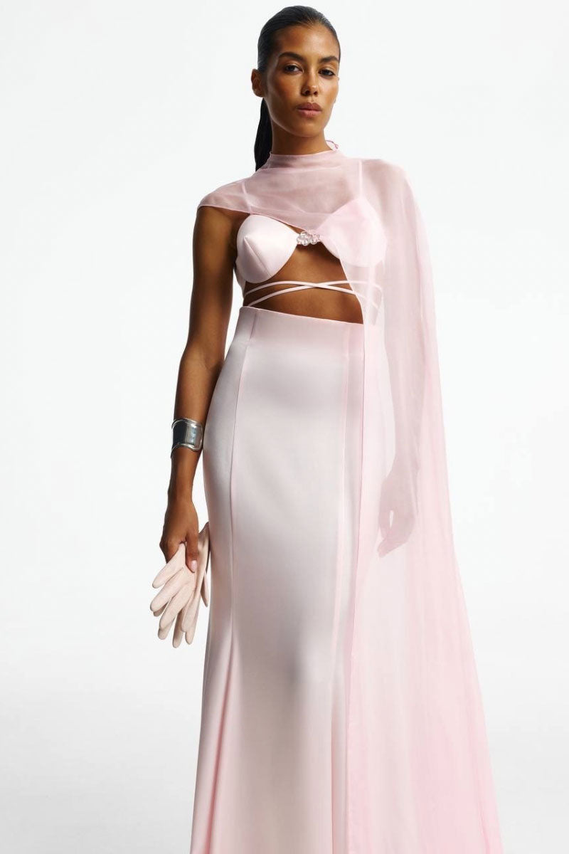 Blush-colored cardigan cape by Santa Brands, stylish and cozy outerwear with a soft, flowing design.