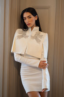 Nadya Shah Ivory Cape Eclat jacket with elegant draping and soft fabric, displayed on a neutral background.