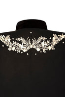 Nadya Shah Cape Nocturne jacket back detail showing elegant black cape with intricate stitching and flowing design.