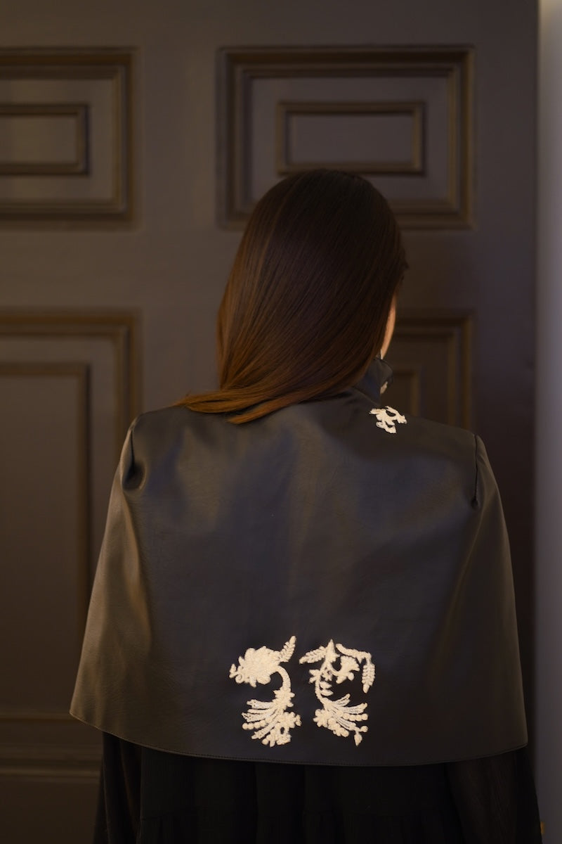 Nadya Shah Cape Victoire jacket in black, shown from the back, featuring a stylish design and tailored fit.