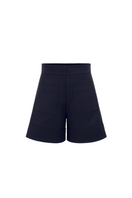 Navy blue Capriccio shorts by ANA + MARIA displayed on a model, featuring a relaxed fit and casual style.