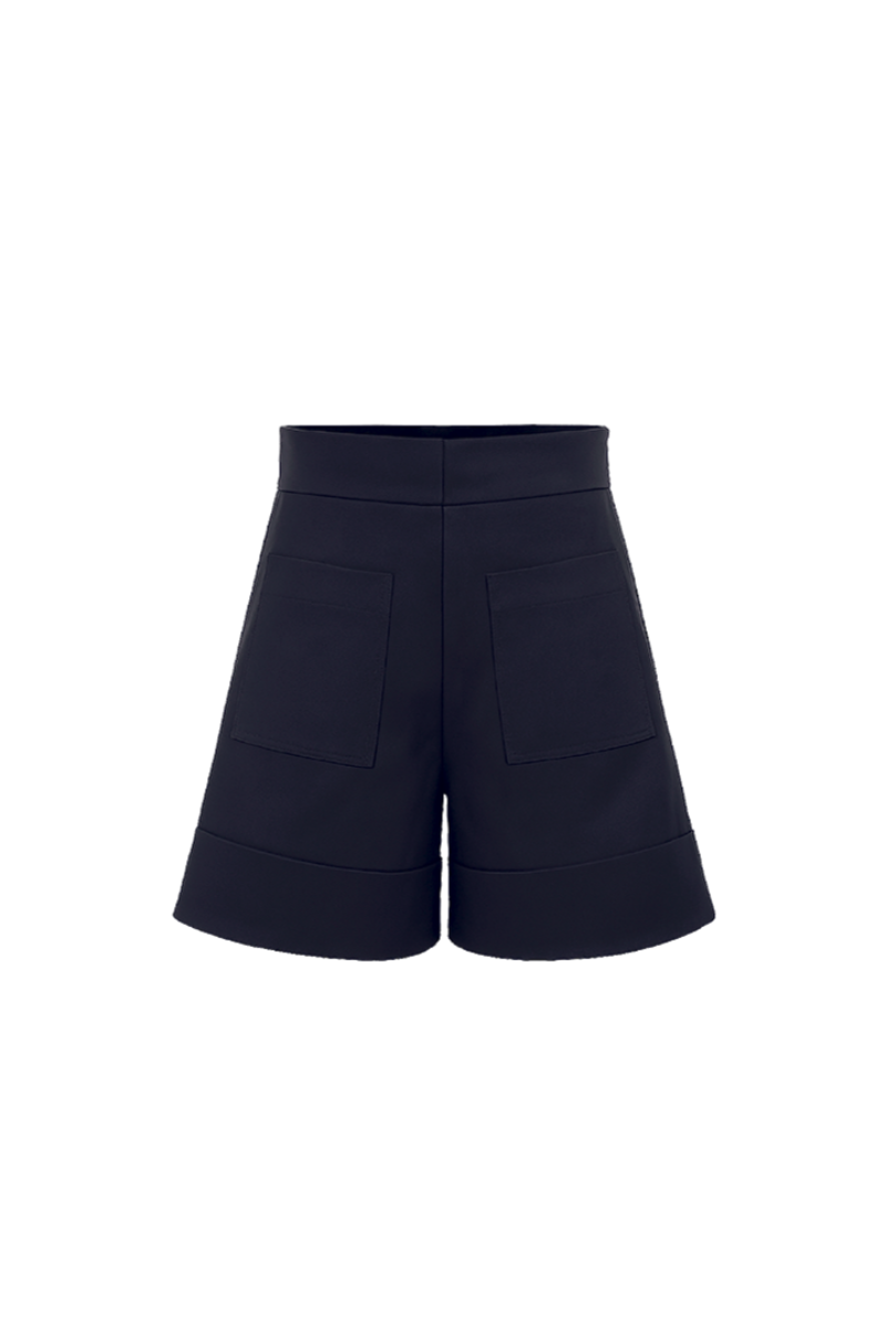 Navy blue Capriccio shorts by ANA + MARIA displayed on a model, featuring a relaxed fit and casual style.